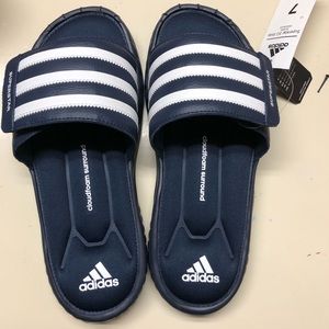 Dark blue slides. Never worn